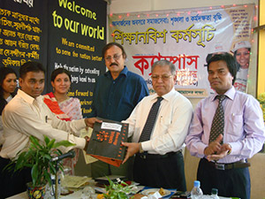 Chairman of RTV & Bengal Group, Morshed Alam, is giving Special Gift to the Best Performer of Apprenticeship Program as Chief Guest. Next to him DG of BTV, M Hamid and Secretary-General of CSDC, Dr. M Helal. (2010)